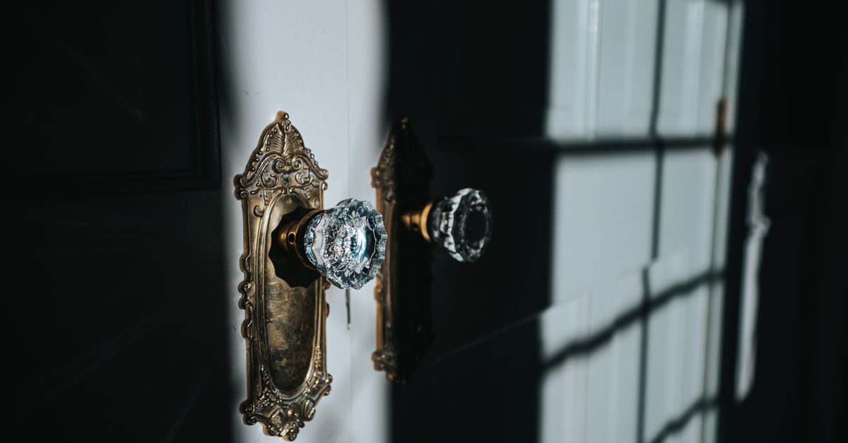 locksmith hands door — A1 Birmingham Locksmith